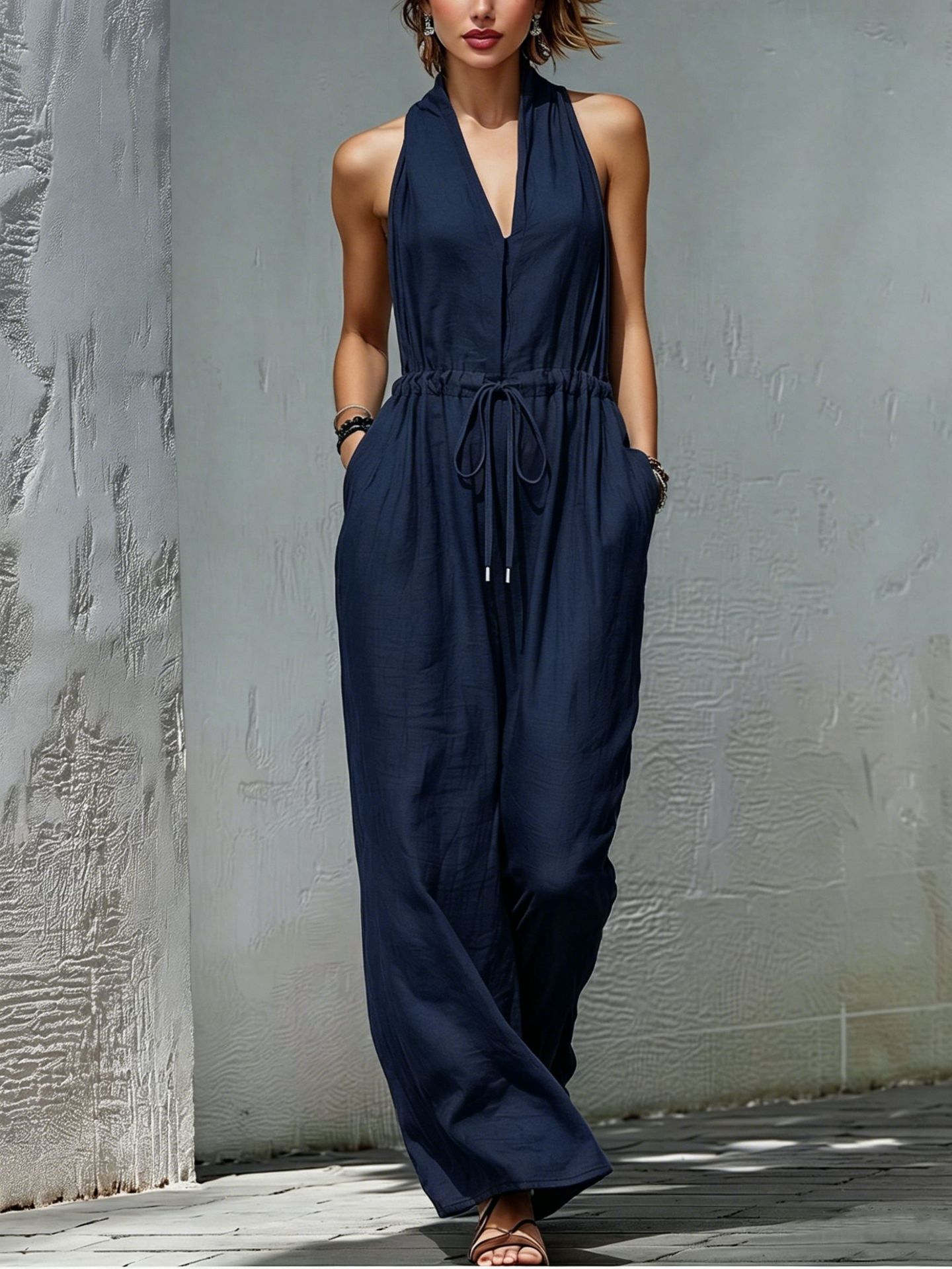 Women's Sleeveless Halter Neck Solid Color Long Jumpsuit.